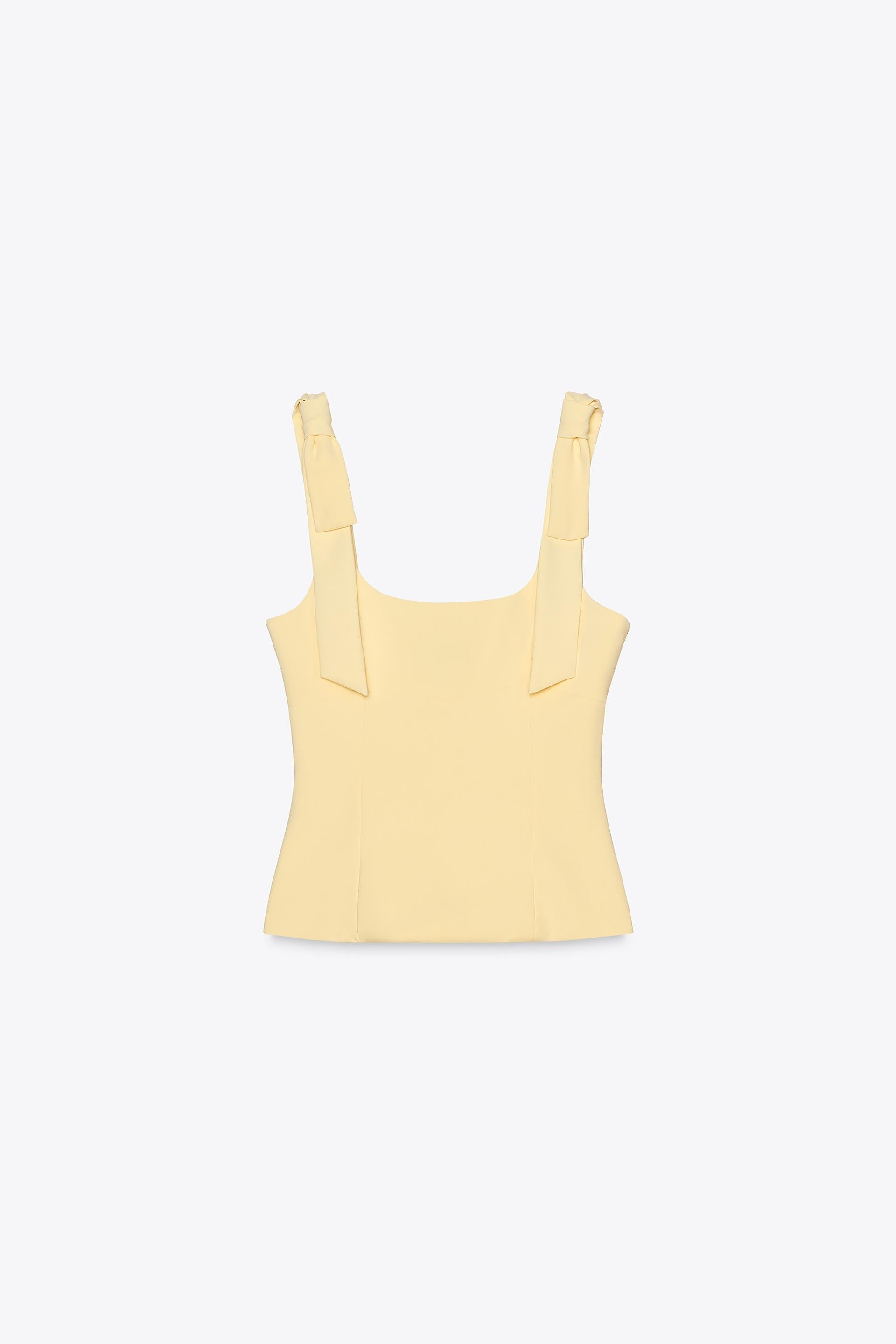 ELYNA STRETCH TOP WITH BOWS