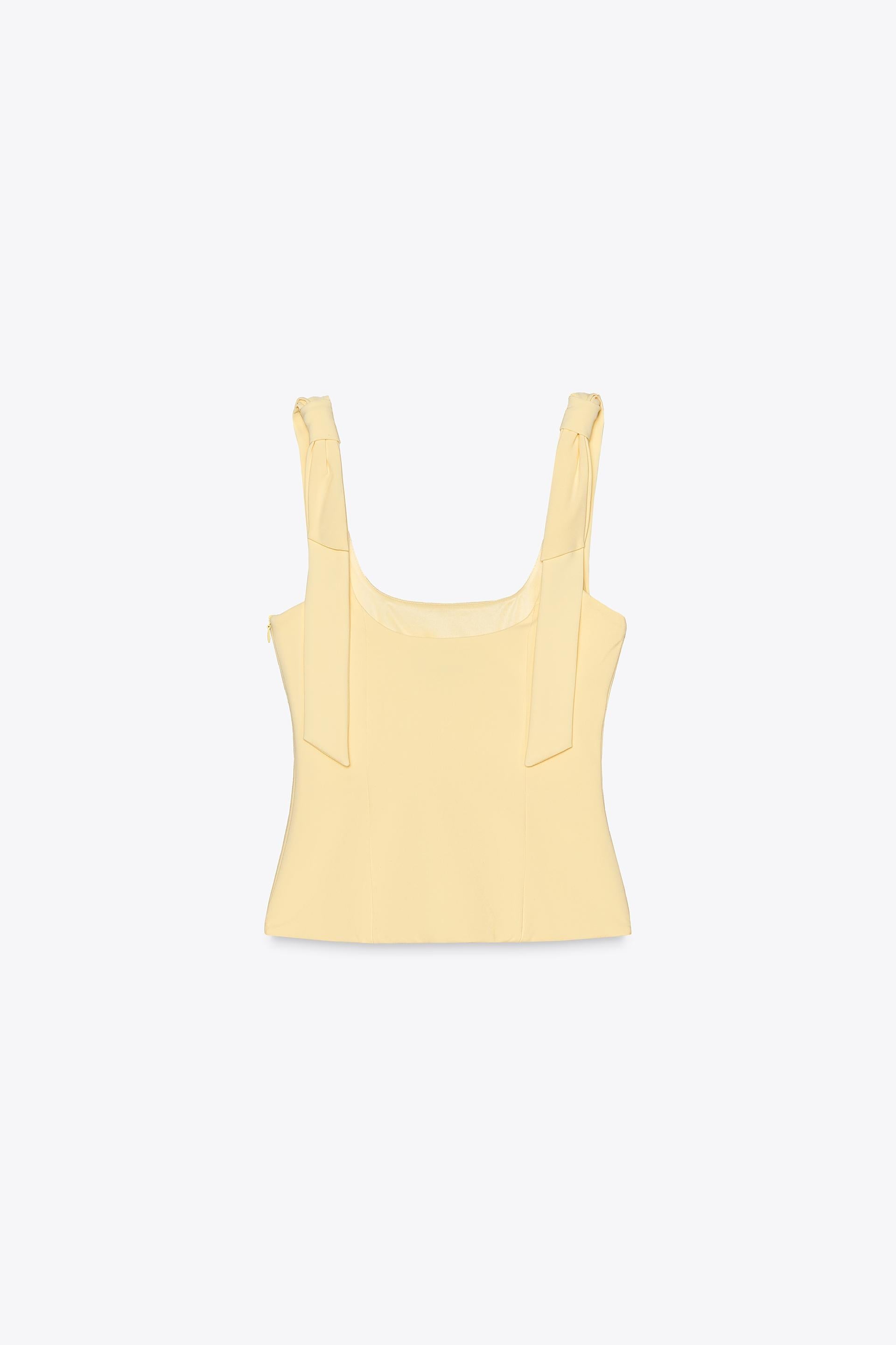 ELYNA STRETCH TOP WITH BOWS